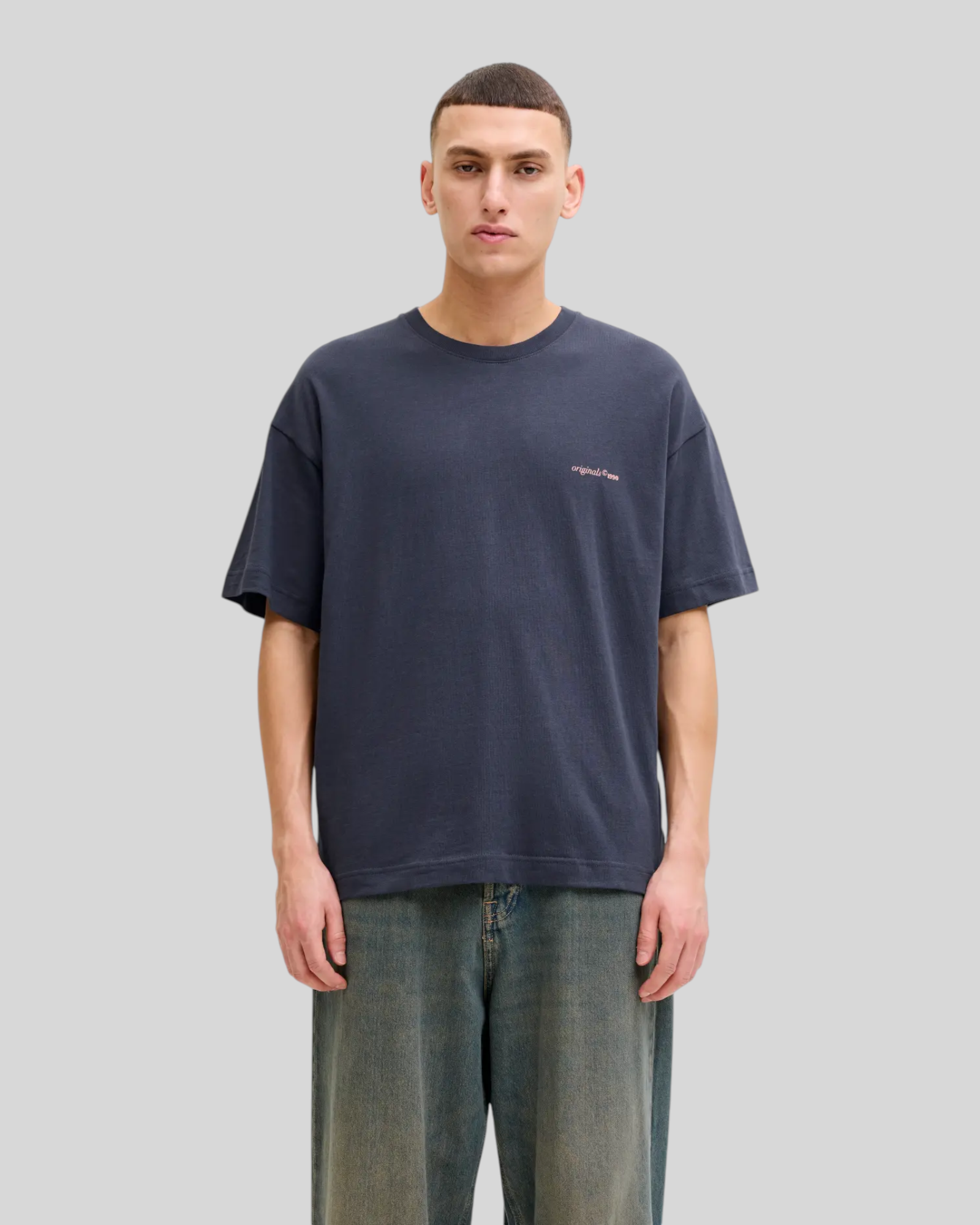 Brillantina Store men's oversized grey cotton t-shirt with 'originals 1990' graphic on chest and back.