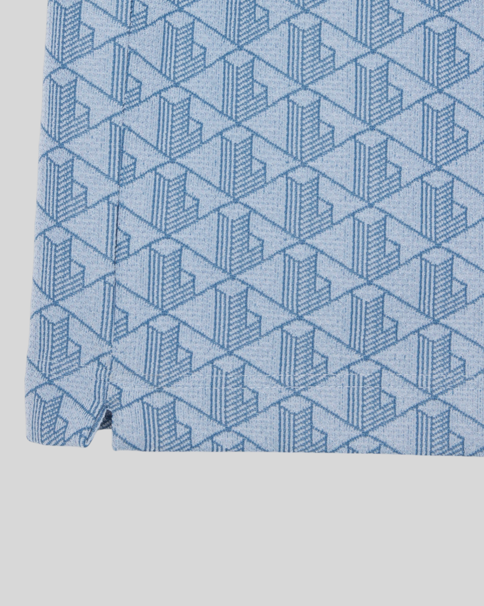 Brillantina Store light blue jacquard polo shirt with all-over monogram pattern and embroidered crocodile logo.